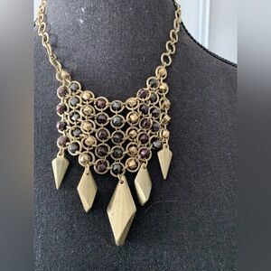 Elegant Gold Coloured and Purple Statement Necklace